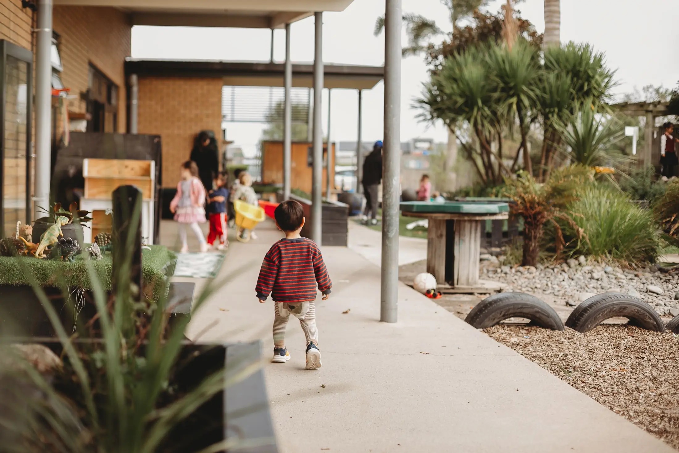 The outdoor path and gardens at Canopy Early Learning